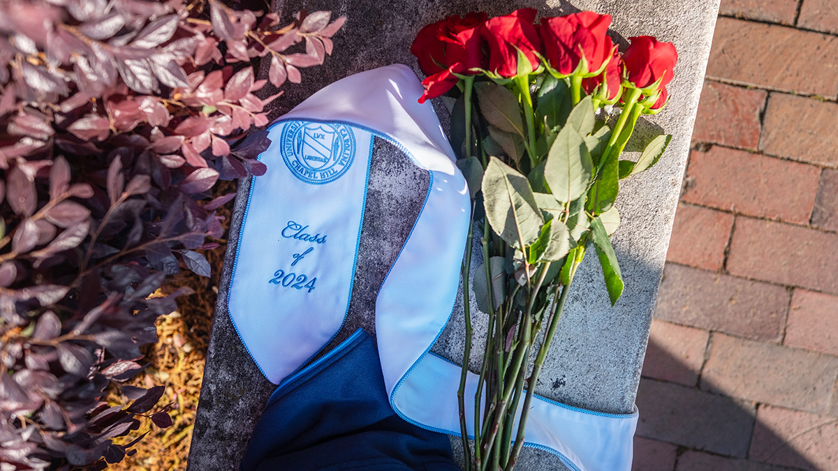A Class of 2024 sash with roses